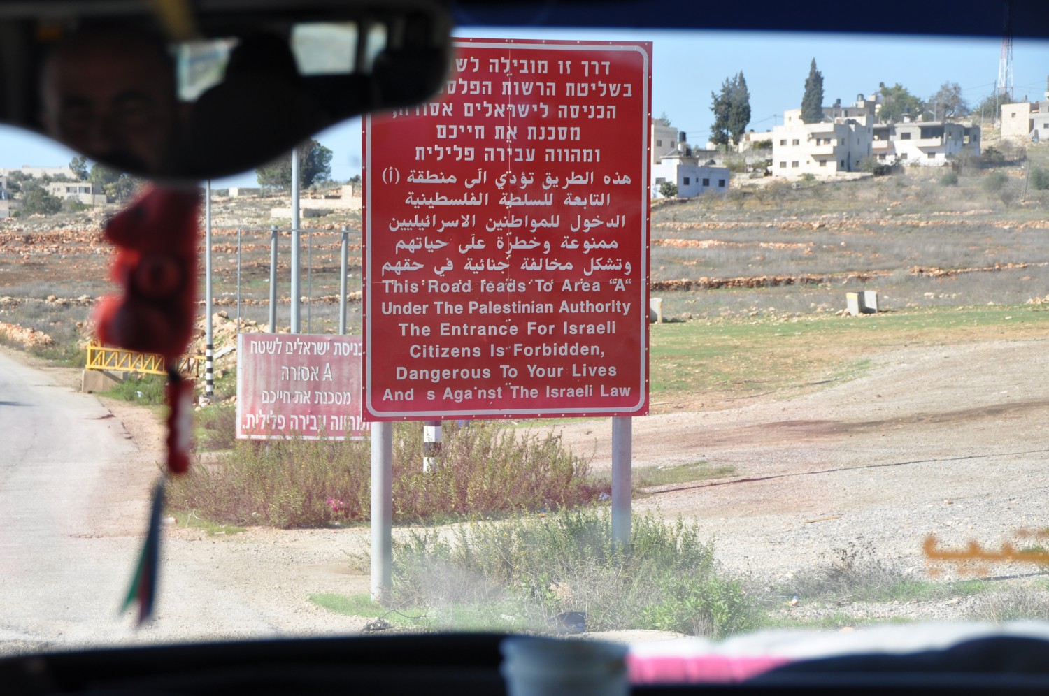 Signpost entering Palestine